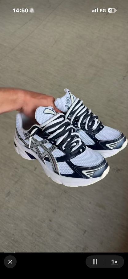 Double-lace styling with original white laces and two additional black laces