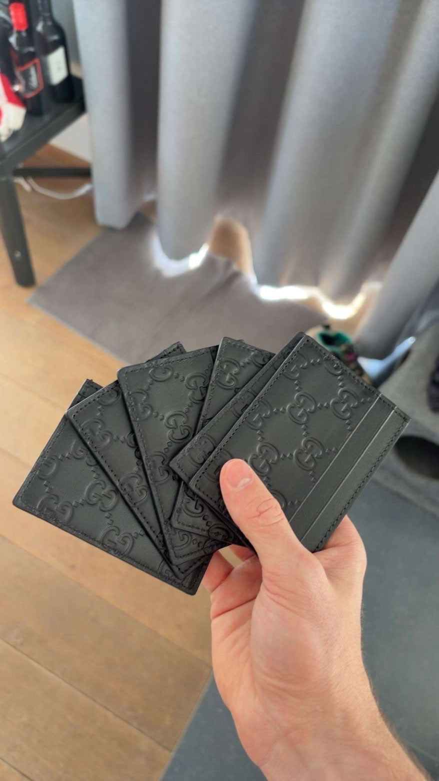 Multiple black Gucci GG embossed cardholders lightly used
